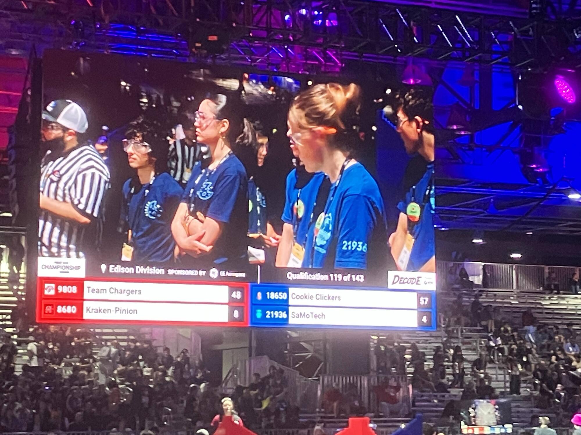 Overhead video board above the competition field at FIRST Championship Houston 2026