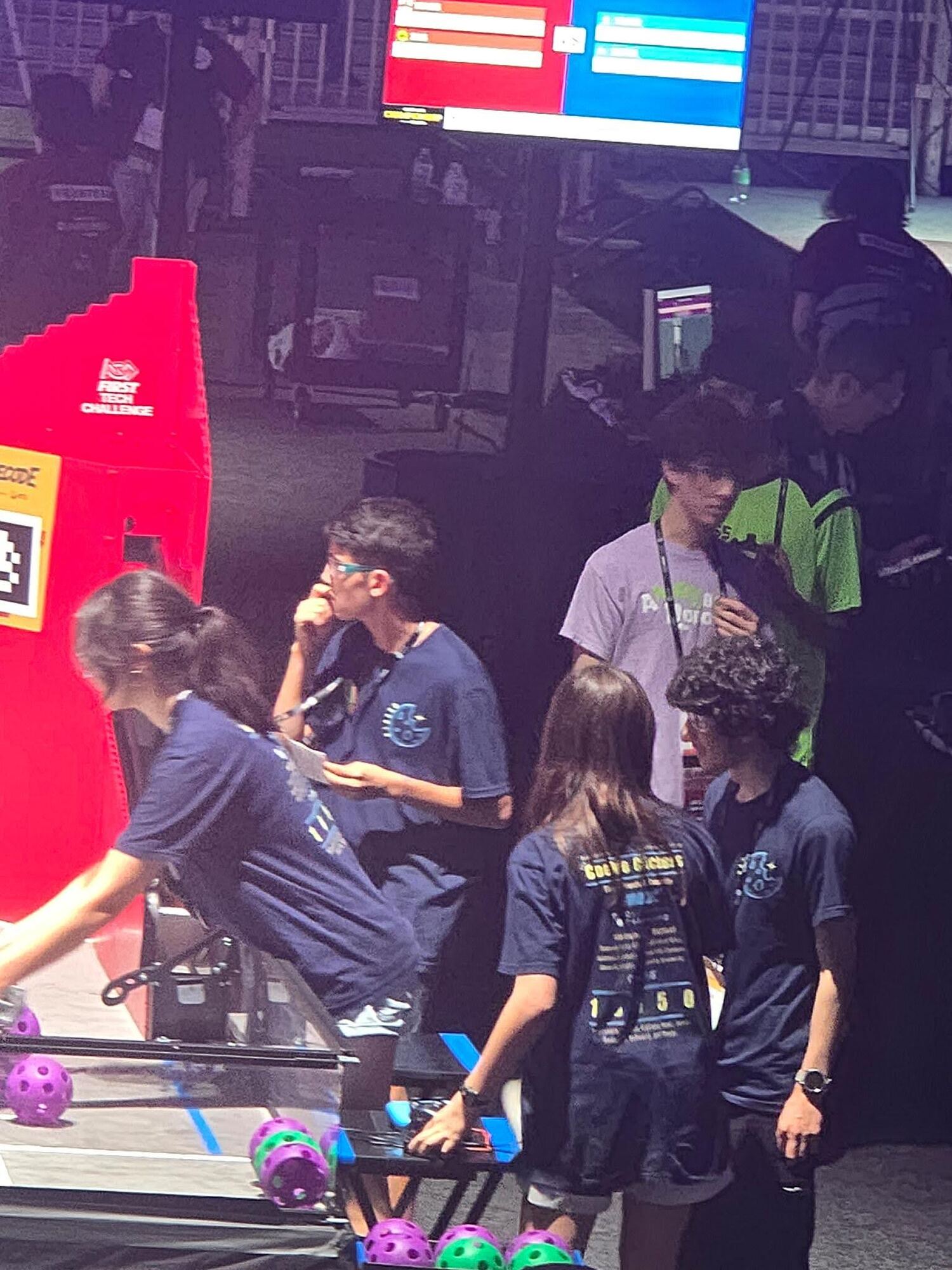 Team 18650 preparing the robot before a match at FIRST Championship Houston 2026