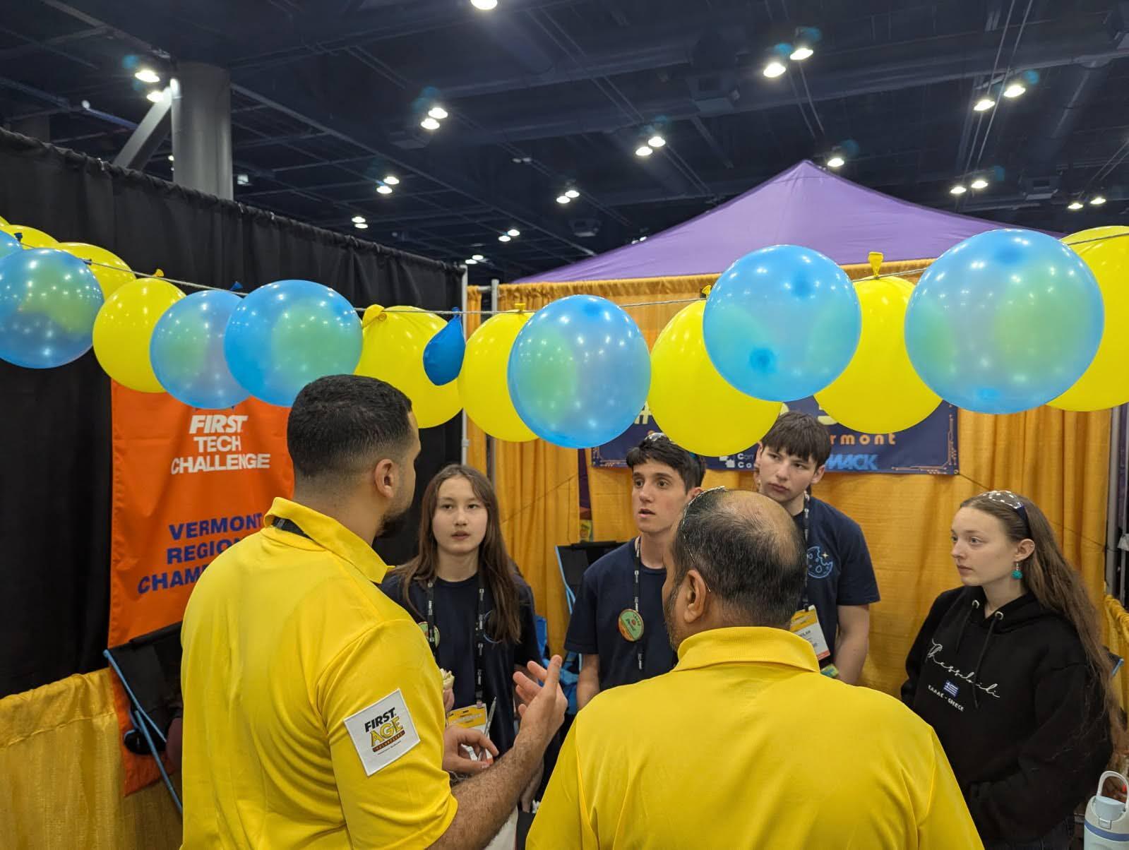 Visitors at the Team 18650 pit during FIRST Championship Houston 2026