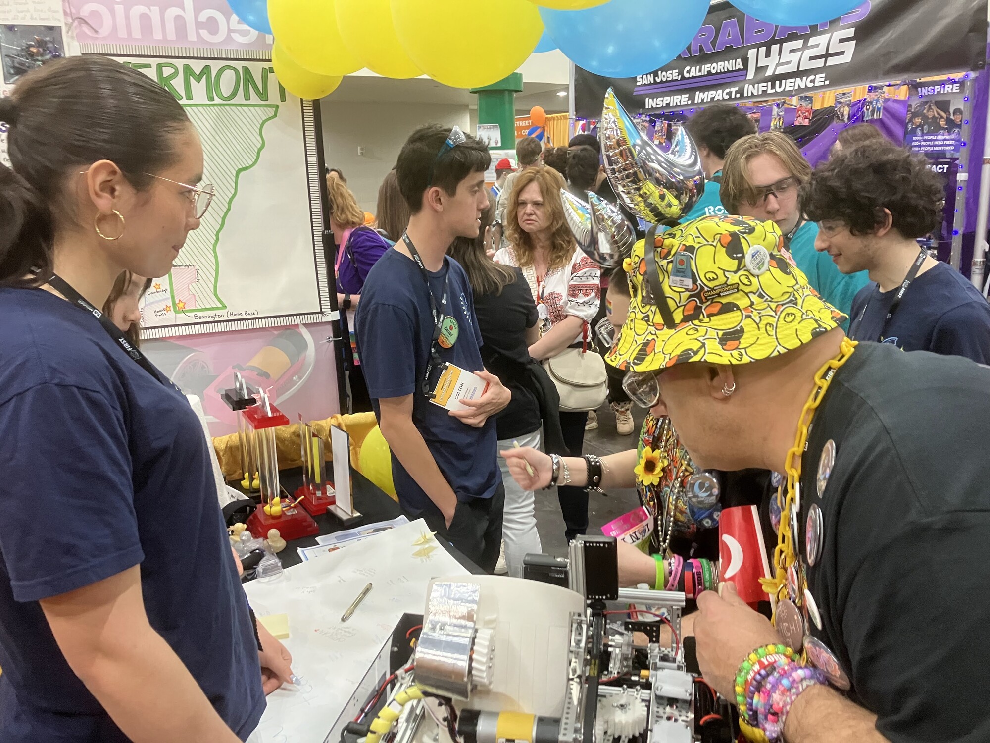 Visitors at the Team 18650 pit during FIRST Championship Houston 2026